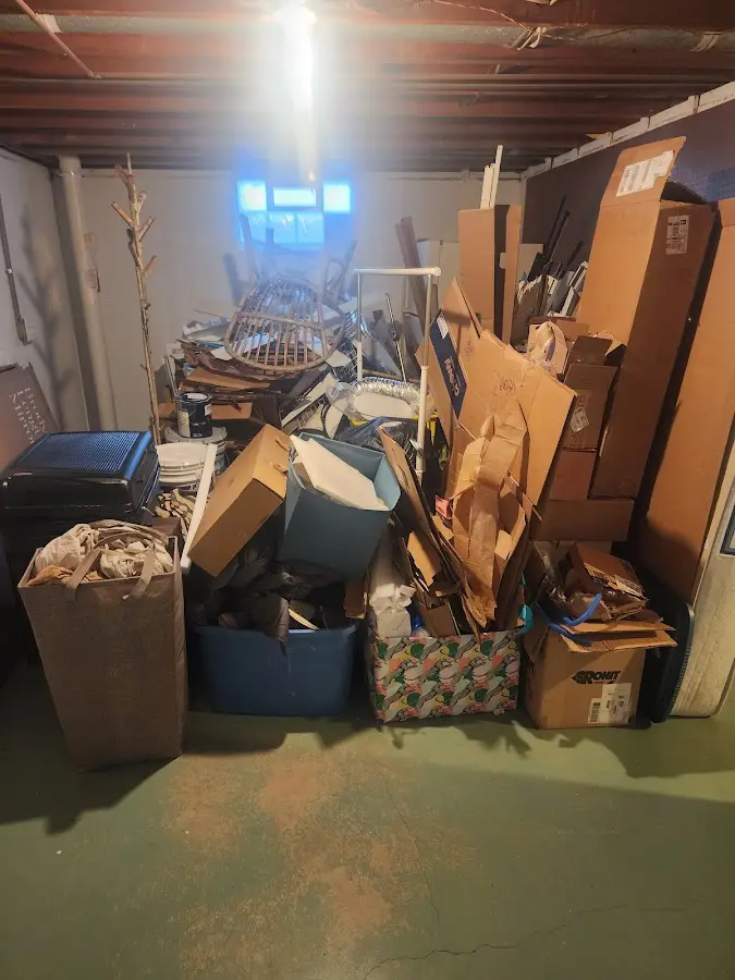 Roll-off dumpster container at job site for Cleanout Dumpster Rental in Old Orchard Beach